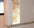 Master bath tub surround with glass block